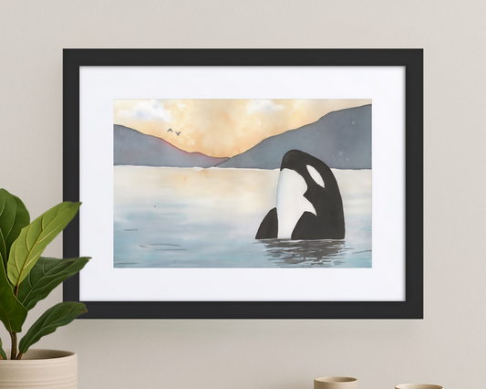Framed Orca Dawn Watercolor Print showcasing stunning oceanic beauty, perfect centerpiece for decor, featuring the orca watercolor print in a vibrant presentation.