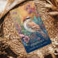 Artistic presentation of the Wild Urban Animal Oracle Deck among city books.