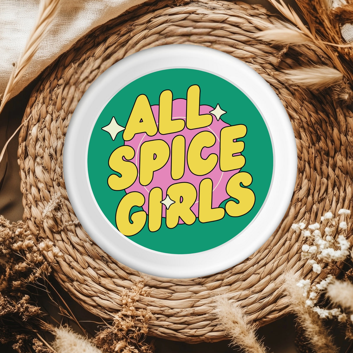 A lifestyle shot of the All Spice Girls Retro Pop Sticker applied to a planner, bringing a fun and whimsical touch to everyday items.