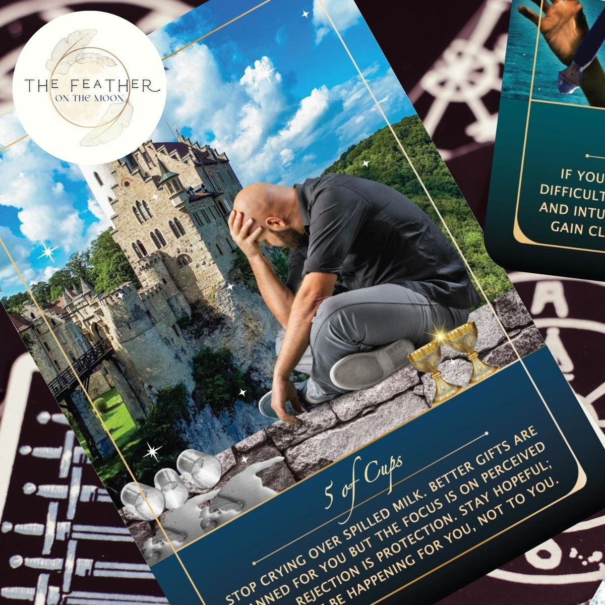 Card from a tarot deck showing a person by a castle with 'The Feather on the Moon' logo.