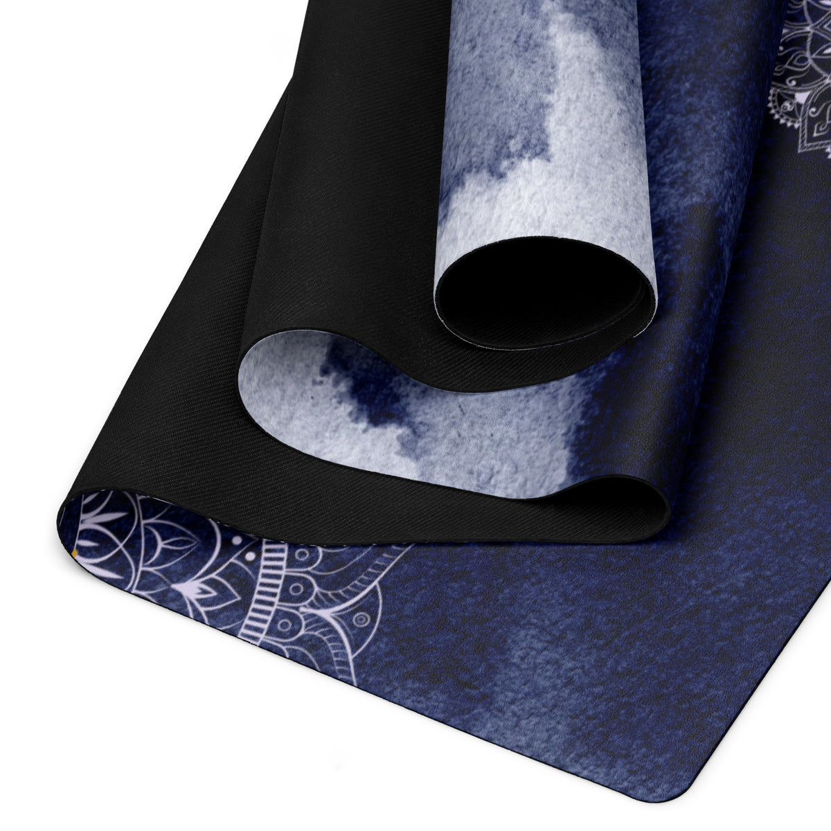 Zen mandala yoga mat featuring a detailed white mandala pattern on a deep blue textured background.