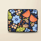 Folk Art Laptop Sleeve on an ivory studio background