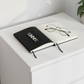 Luna Notebook on Bedside Table