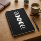 Moon Phase notebook on a warm writing desk