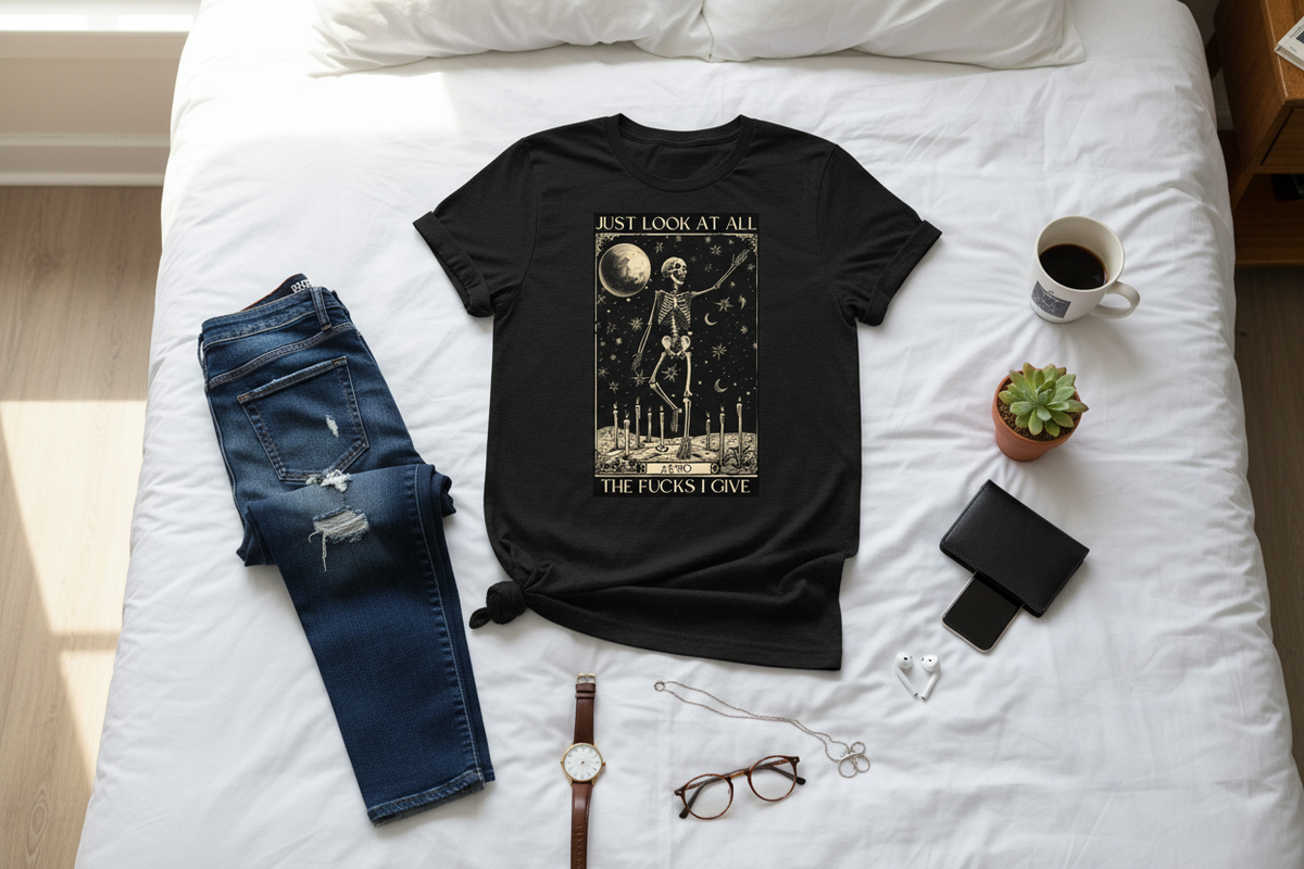T-shirt flatlay on bed